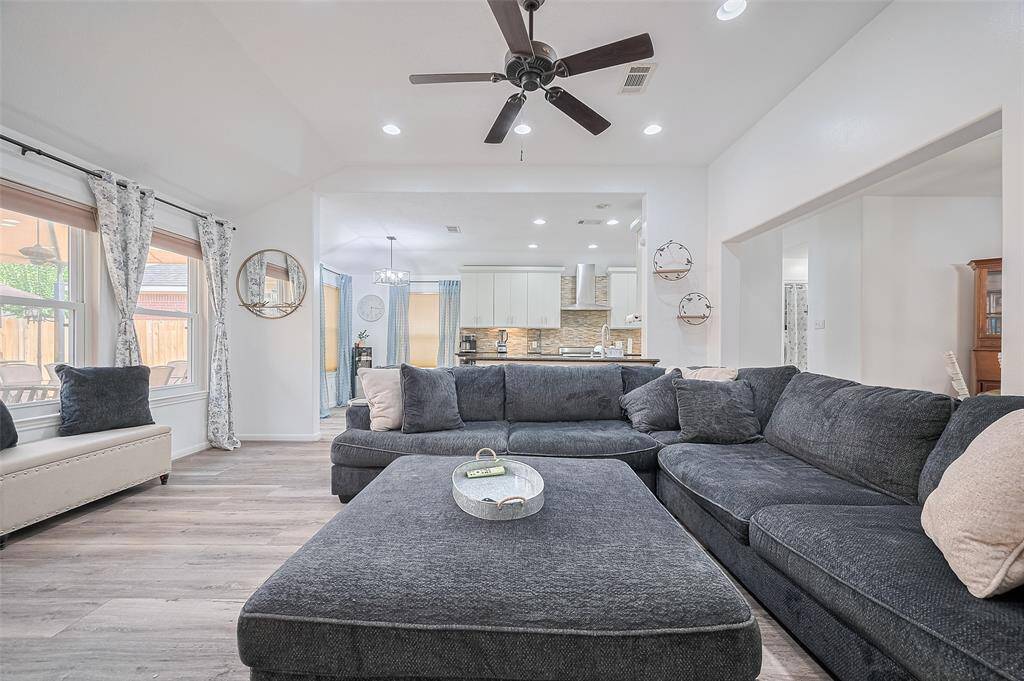 Effortless flow from the kitchen into the spacious living and dining areas, making this home ideal for hosting.
