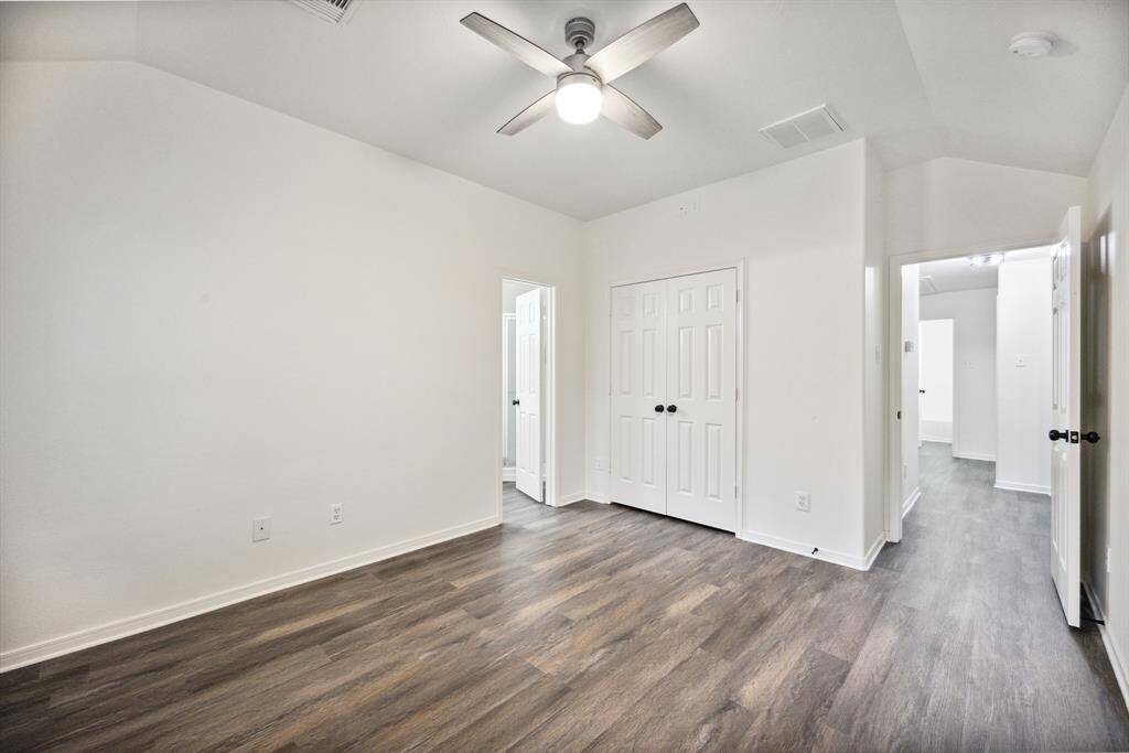 A generous retreat with a wall of windows and direct access to your en suite.