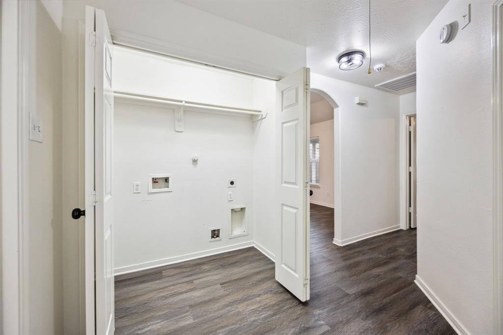 Tucked away and functional—this laundry space makes everyday tasks feel easy.