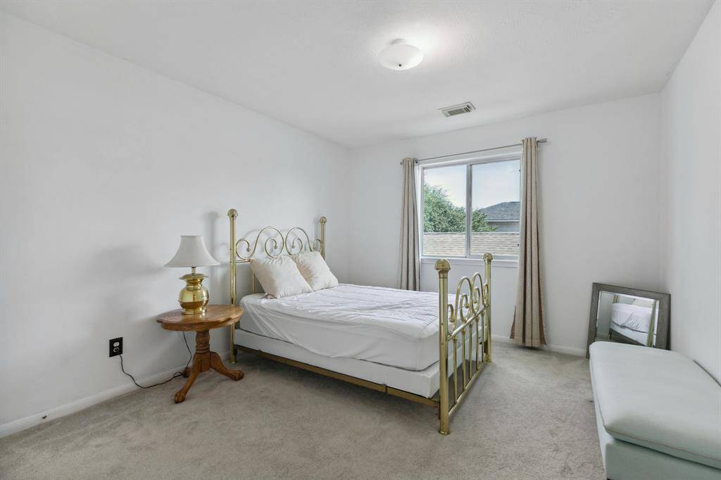 The third bedroom is filled with abundant natural light.