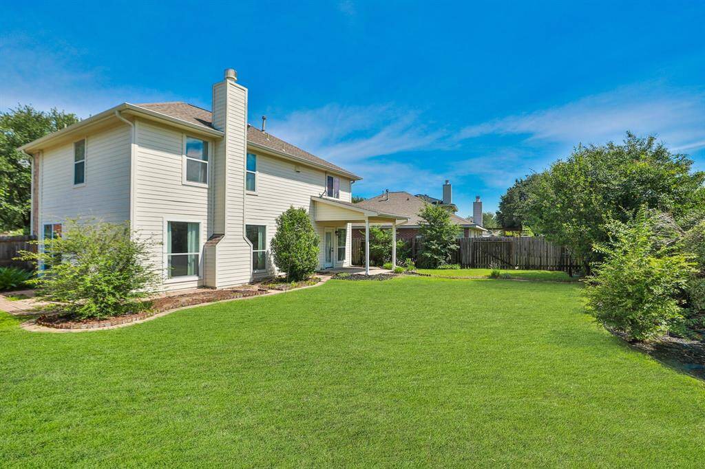 The expansive backyard provides plenty of space for a pool.