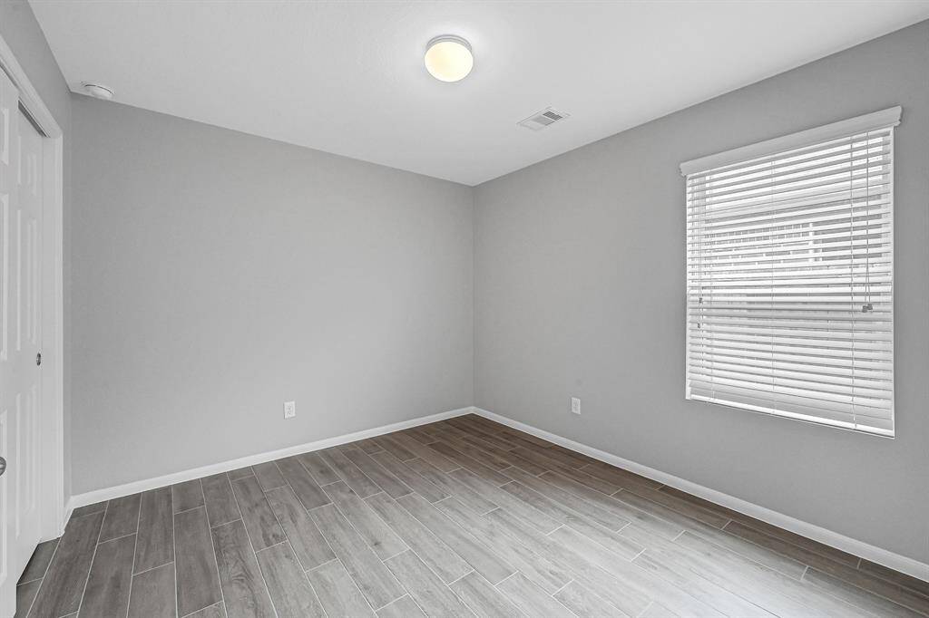 Third bedroom with natural light and great space located at the right side of the property