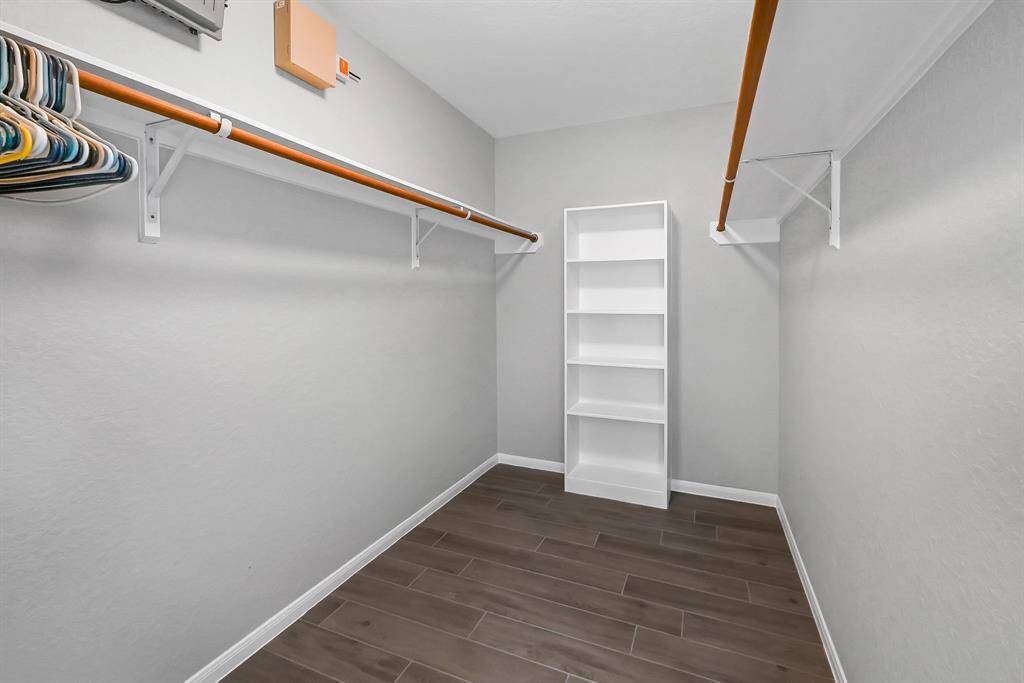 Very convenient space in this walk in closet at the primary bedroom