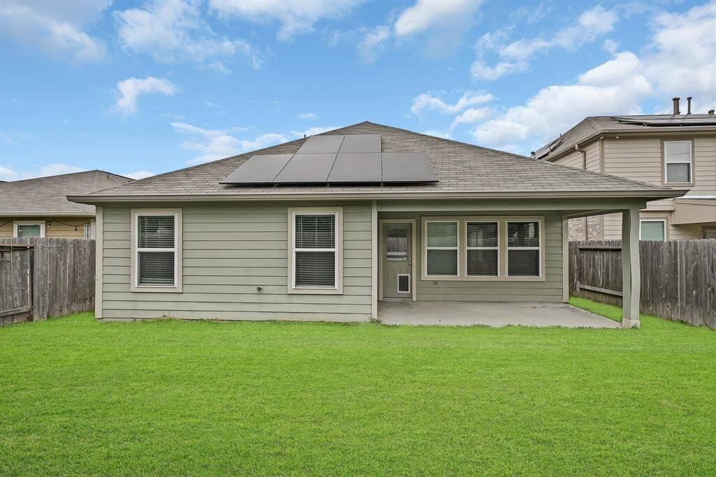 Plenty of solar panels to reduce your energy bills. More solar panels at the left side of the roof