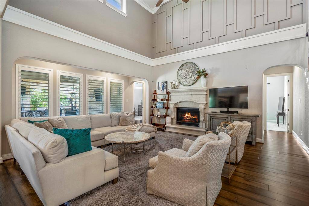 Natural light streams in from the cathedral ceilings, which have crown moldings surrounding the openings.