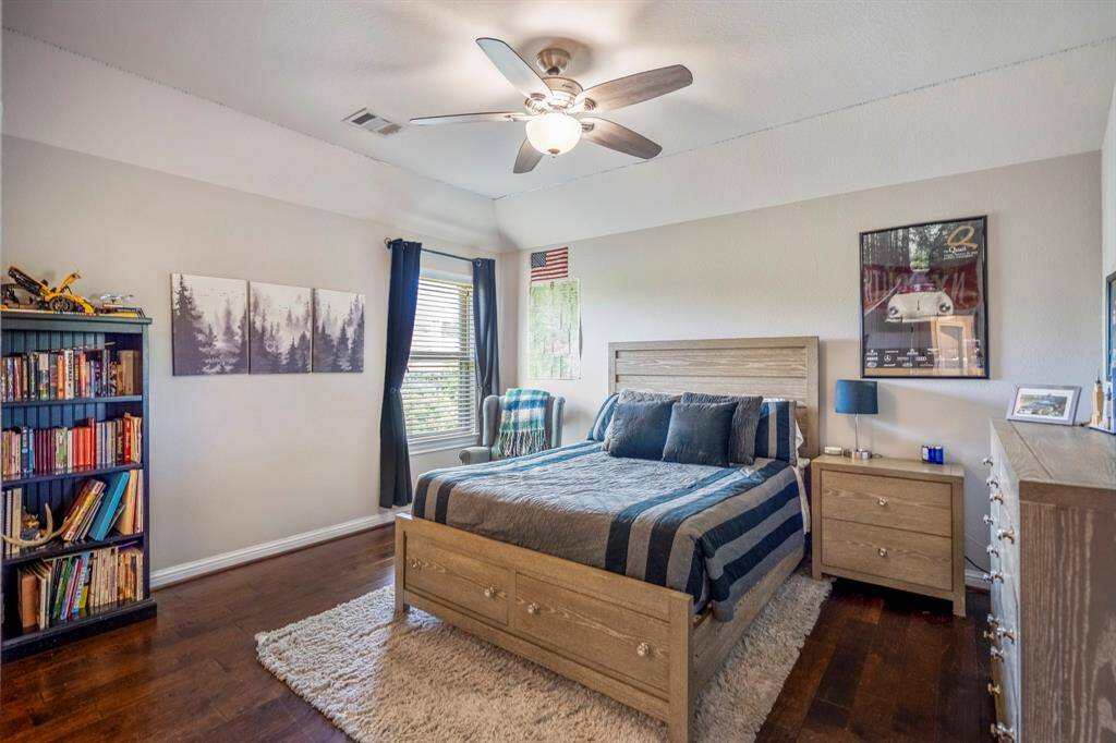 The third bedroom which is upstairs is spacious offers plenty of light and beautiful wood flooring.