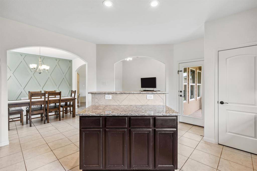 Island/ Breakfast bar; walk-in pantry off to your right