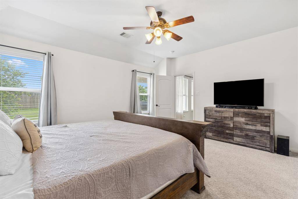 Primary bedroom located in the back of the house