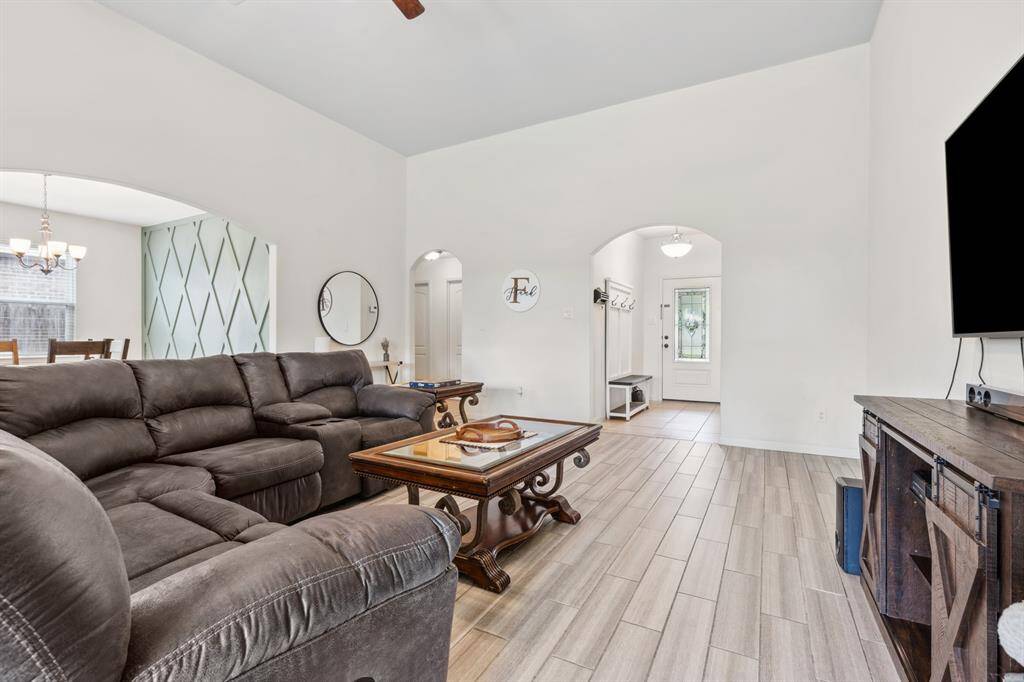 Massive Living room area with tall ceilings
