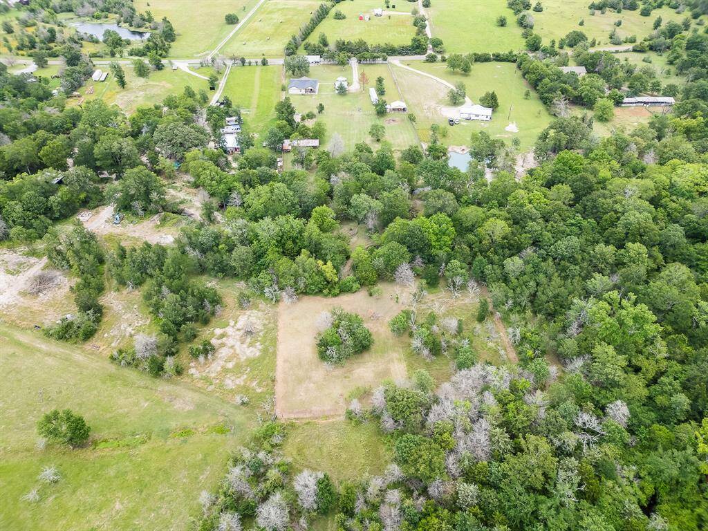 Expansive wooded surroundings offer privacy and scenic views—your peaceful escape from city life.