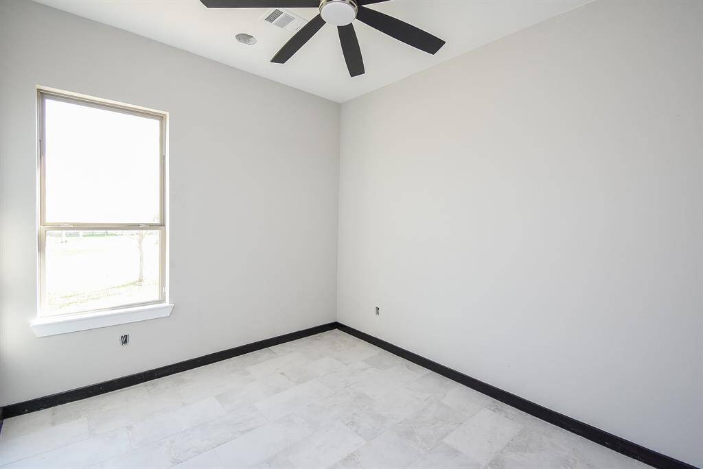 Bedrooms are spacious with ceiling fans.
