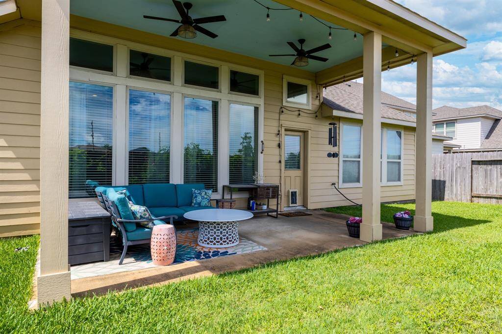 Dual ceiling fans on back porch