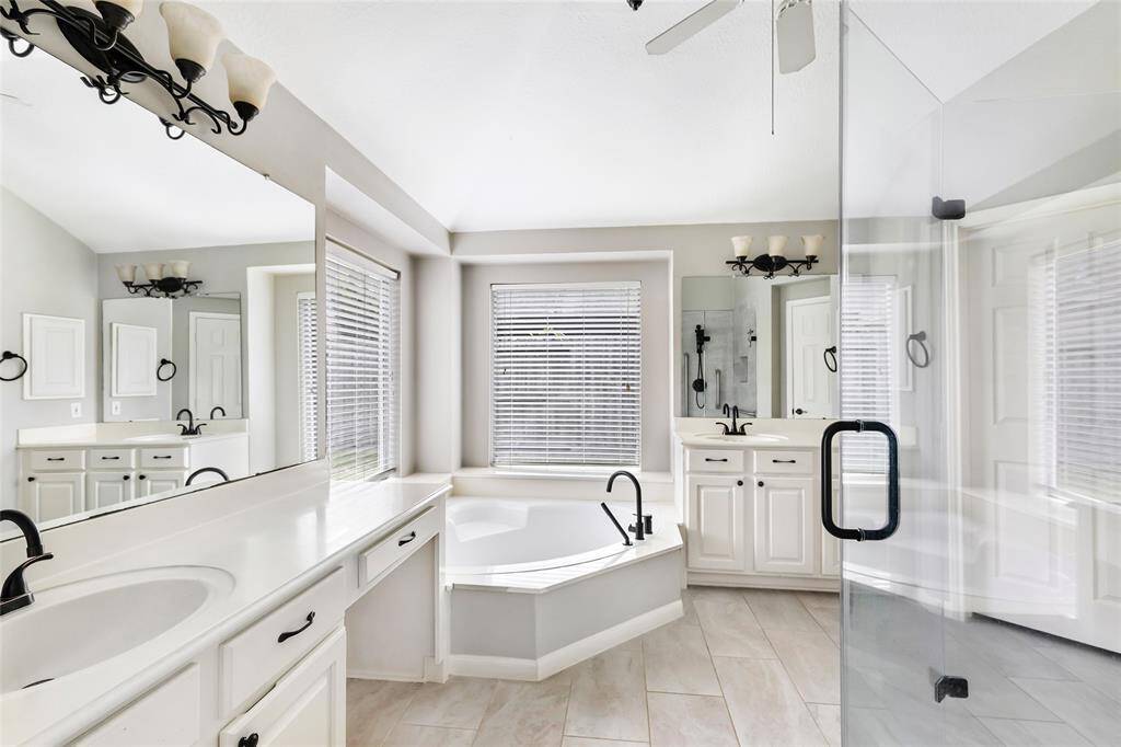 Double vanities and a soaking tub.