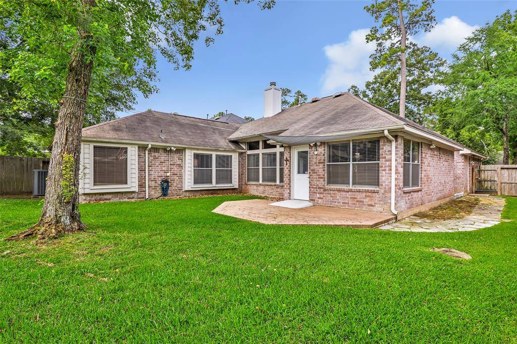 Lovely, spacious backyard with patio.