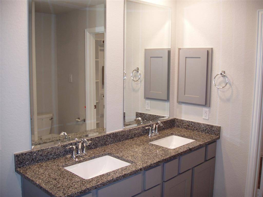 Lots of cabinet space and under mount sinks.