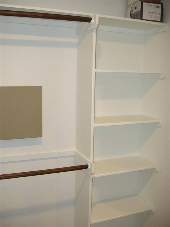 Lots of space and built-in shelving in the master closet.