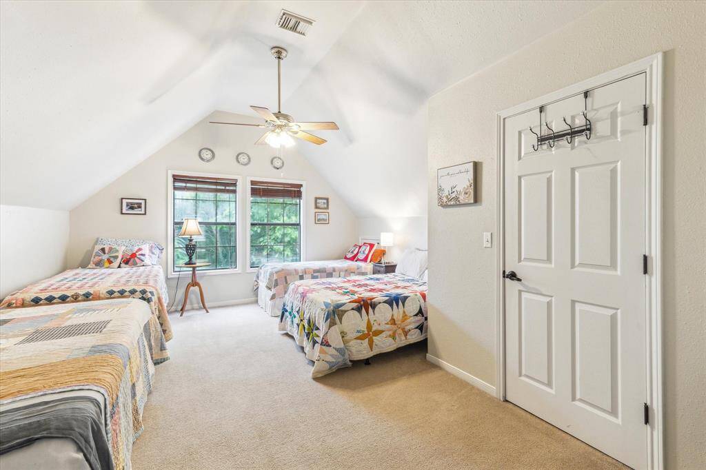 Upstairs bedroom is spacious enough for a full sized bed and 3 twin sized beds with space to spare.