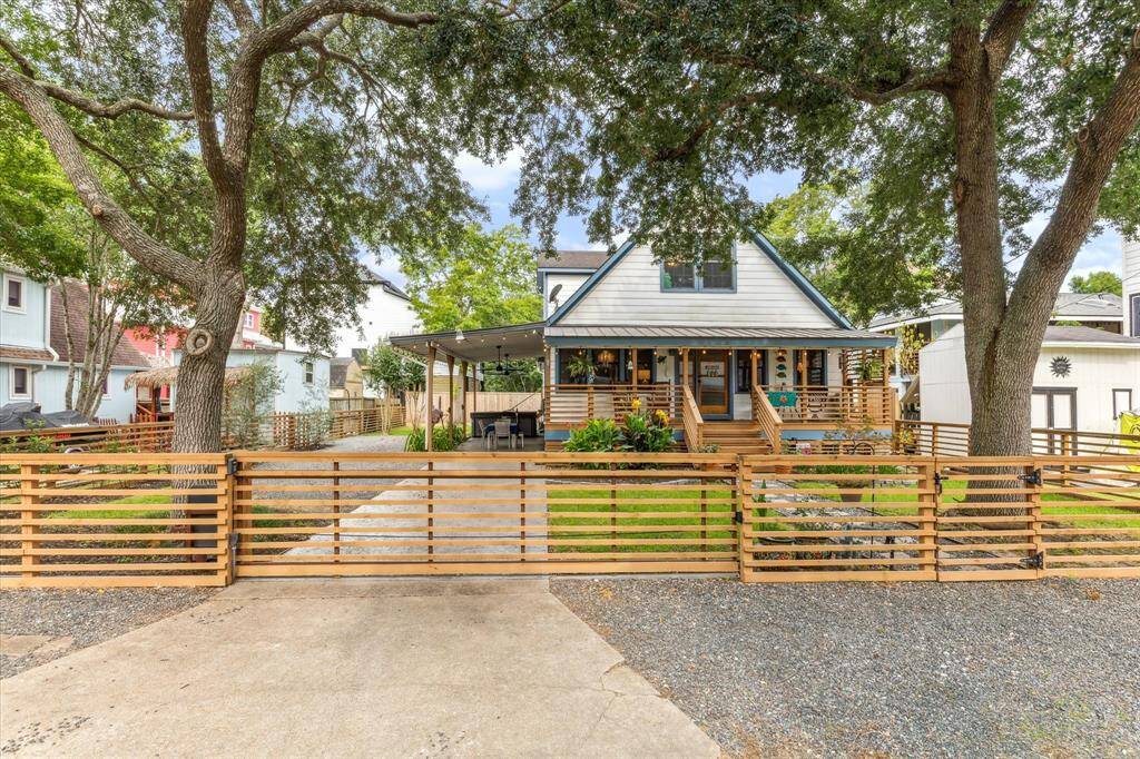 Fully fenced yard with automatic gate for easy entry.