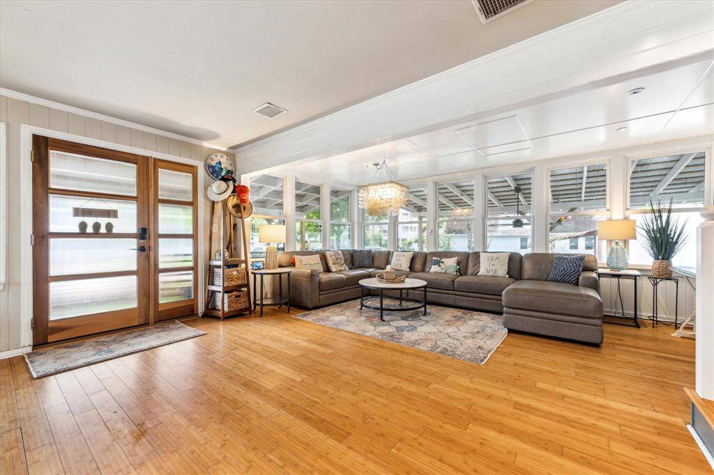 Spacious living room with lots of natural light.