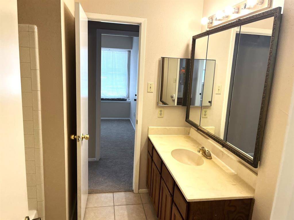 ... and another view showing how it connects to the main hallway and the other two bedrooms