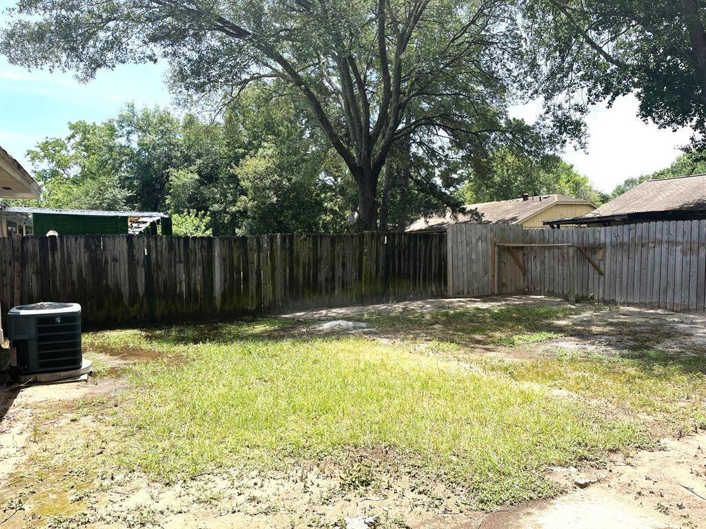 Another picture of the yard. Think pool, trampoline, large sitting area...