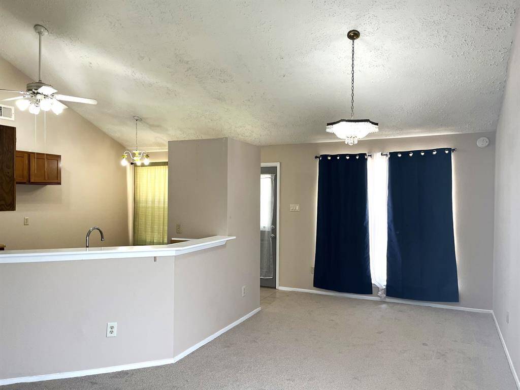 Here's the dining room and a view of the kitchen