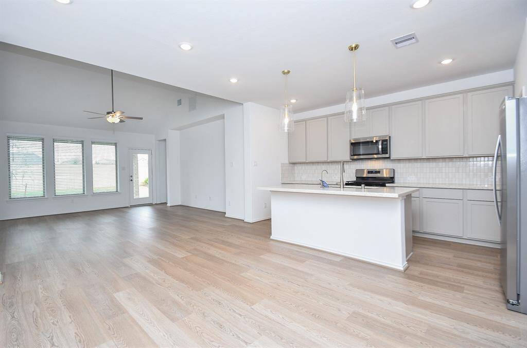 Expect admiring comments from guests whey they visit for the first time! This is the core of your home: an amazing combined living/family/kitchen area for everyday and special day enjoyment.