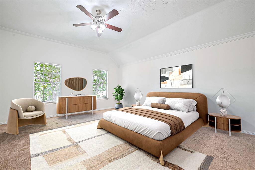 Virtual Staging: The primary bedroom upstairs features a 10-foot ceiling, crown molding, and a light fixture adorned with crown molding