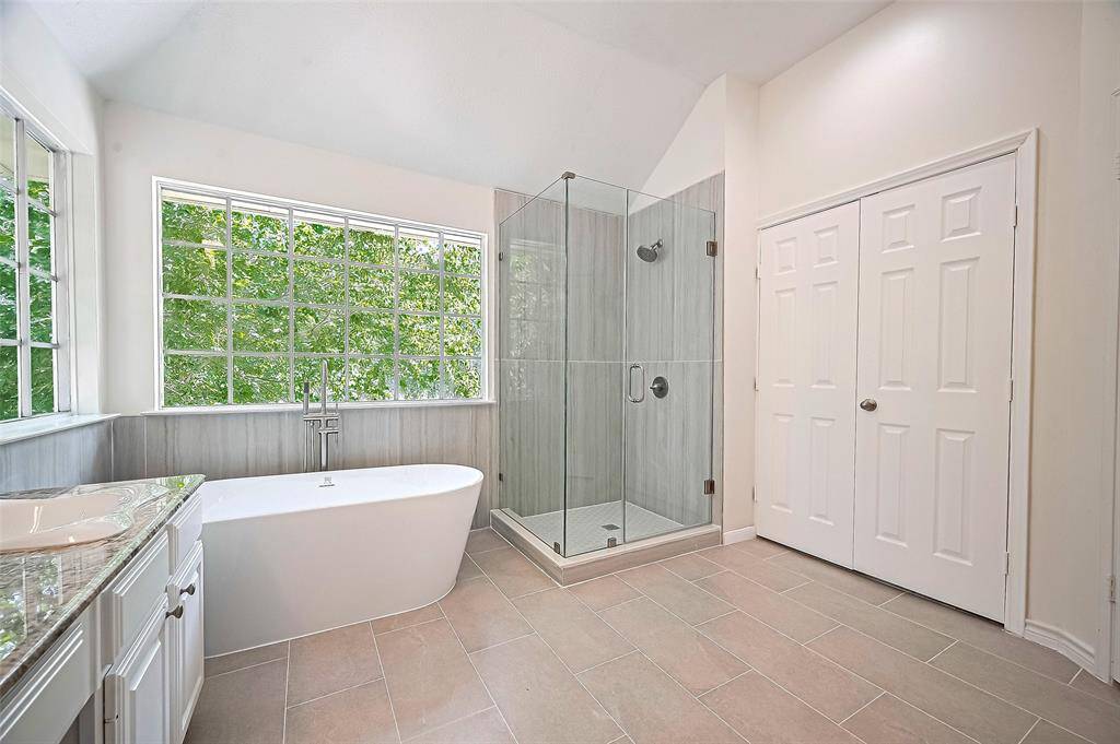 Luxurious Soaker tub and a separate glass enclosed shower