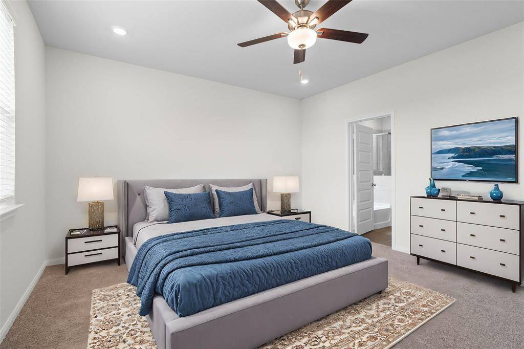 What a wonderful place to come home to, this stunning primary suite greets you with plush carpet, a neutral custom paint, high ceiling, ceiling fan with lighting, large windows allowing in natural light brightening up this spacious primary bedroom. *virtually staged*