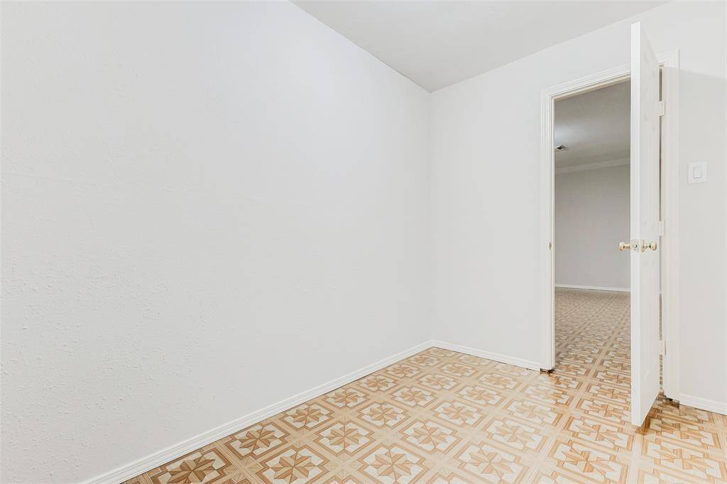 This additional storage closet is off the extra storage room or can be used to accommodate media controls and/or media items.