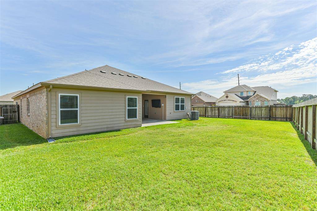 Huge backyard and side yard with no side neighbors and greenspace behind.