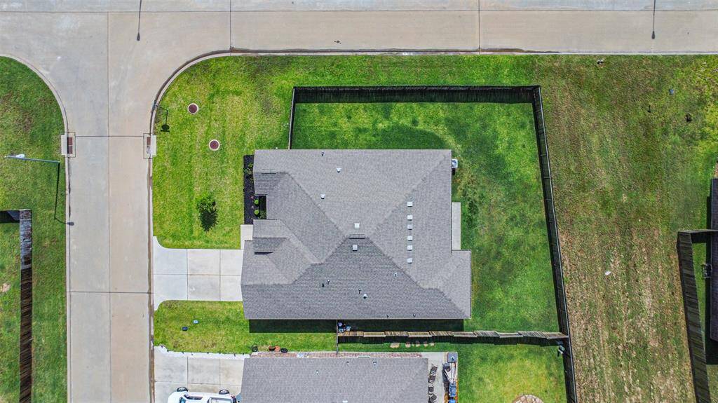 Plenty of room in this yard for a pool, a garden, or other outdoor activities.