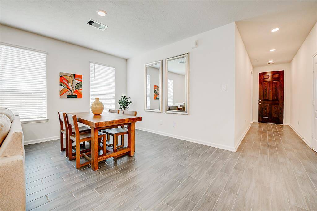 Upon entry the 2 extra bedrooms and secondary bathroom are at the front of the home, while the dining, living, kitchen and primary are at the back of the Home!