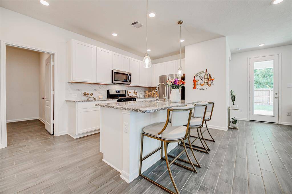 Whether you're hosting a chic dinner party, gathering the family, or casually entertaining, this space was built for connection and comfort.