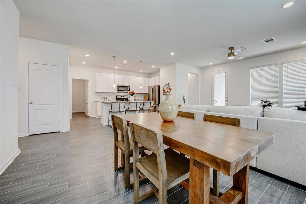 Whether you're hosting a dinner party or enjoying a quiet morning coffee, this open-concept space keeps you connected at all times.