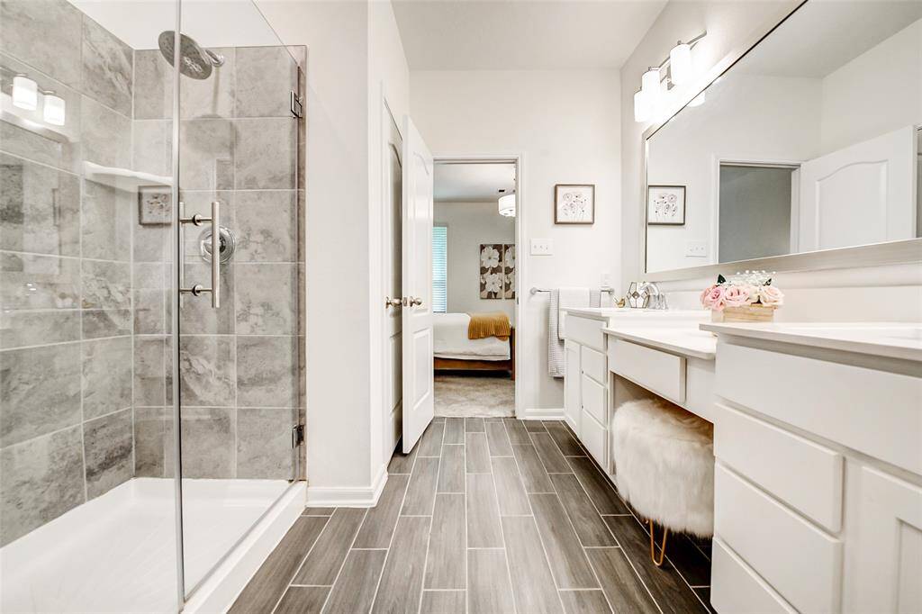 Every detail has been thoughtfully designed to bring calm, comfort, and convenience to your daily routine. Linen closet on your left.