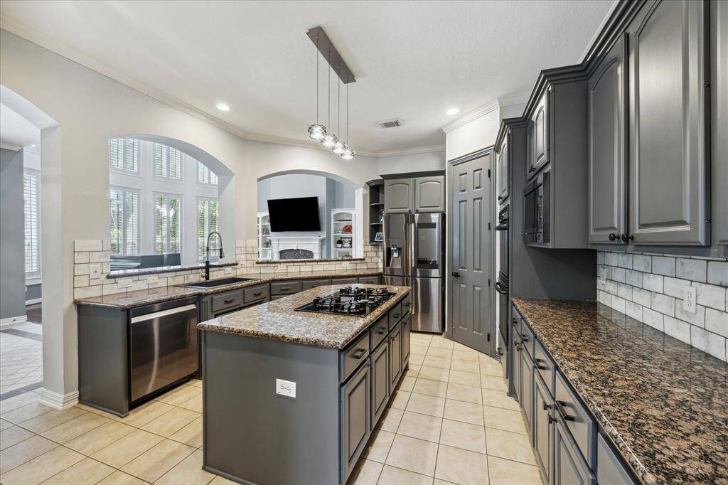 A Kitchen Made for Hosting & Living: Perfectly positioned at the heart of the home, the kitchen connects effortlessly to the breakfast room, butler’s pantry, living room, wine bar, and MUD room—designed for seamless flow and everyday function.