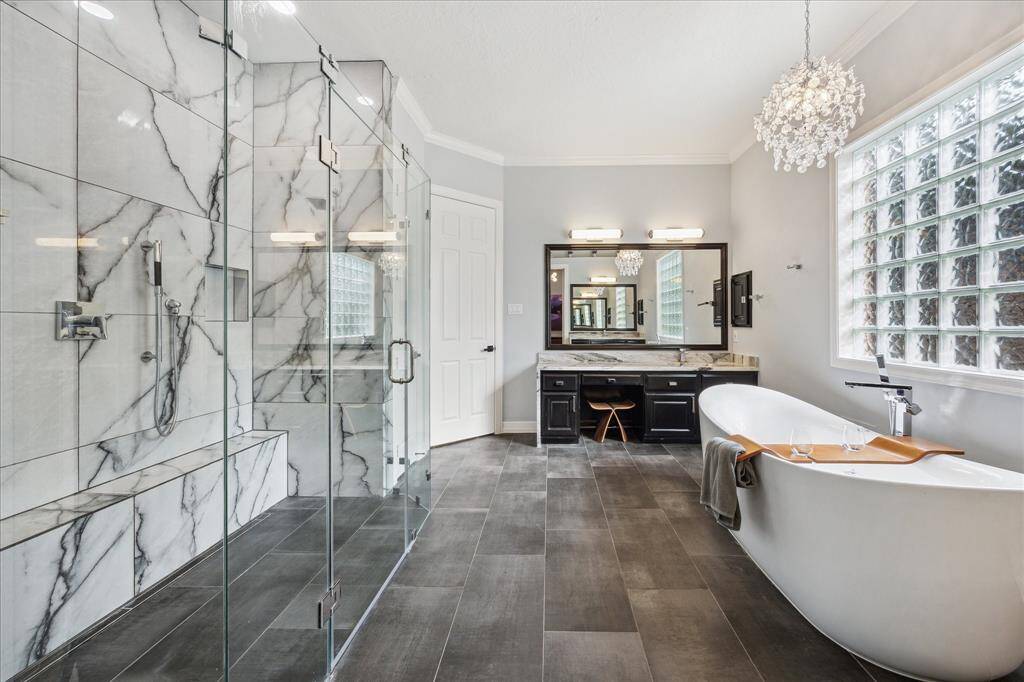 Thoughtful Storage, Functional Design, & Double Vanities: Designed for both luxury and practicality, this layout includes two distinct vanities with dedicated medicine cabinets, a seated makeup area, and a linen closet for tucked-away storage — offering the perfect blend of form and function.