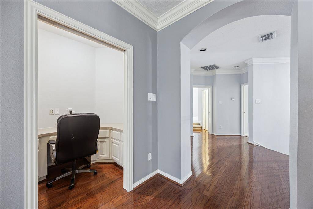 Dedicated Work Zone Off the Game Room: Tucked behind a pocket door, this built-in desk nook offers a quiet, functional space for studying, remote work, or crafting.