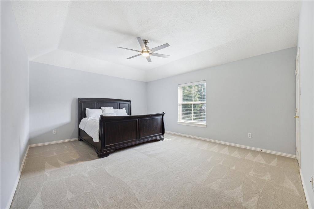 Spacious Secondary Bedroom with Walk-In Closet: Each secondary bedroom is oversized, light-filled, and includes a full walk-in closet—designed with room to grow.