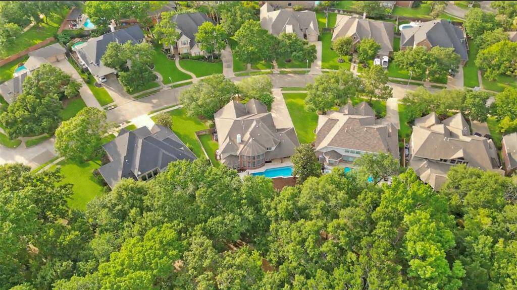 Aerial View of Lot & Location: This home offers rare privacy and direct access to Cinco Ranch’s hike & bike trails.