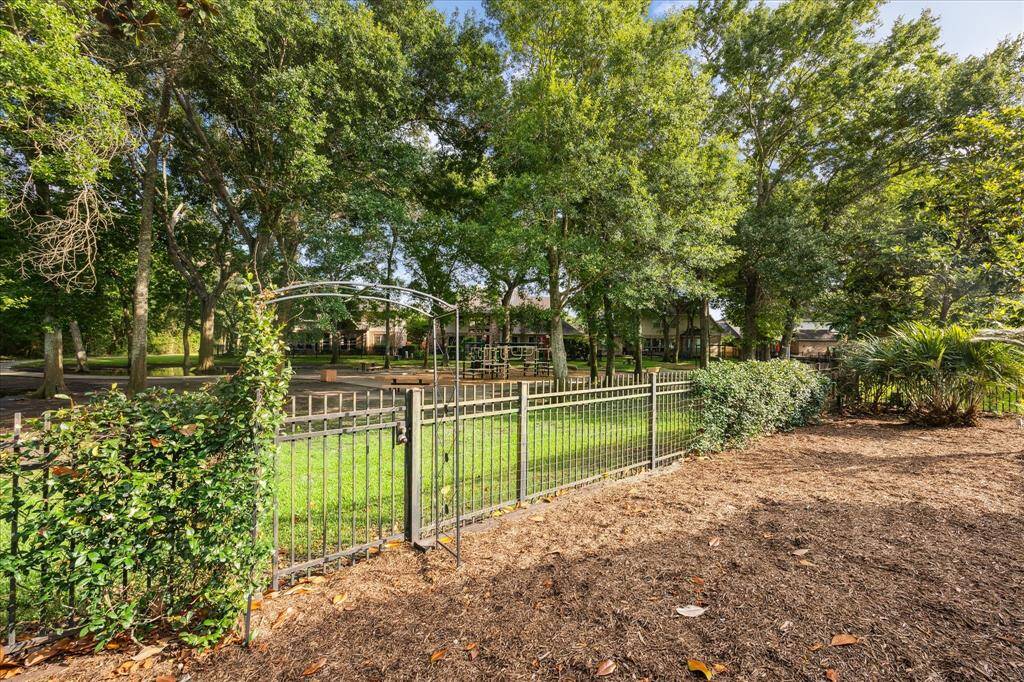 Direct Access to the Neighborhood Park & Trails: Step through your private gate and into Cinco Ranch’s wooded preserve, where lush trails and a neighborhood playground are just beyond your backyard.