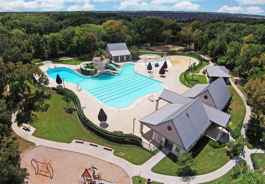 Waterpark Fun for All Ages: Waterslides, splash pad, diving boards, and a playground make this one of Cinco Ranch’s most iconic amenities. With over 50 miles of trails, 11 resort-style pools, and year-round neighborhood events, life in Cinco Ranch is built around connection, recreation, and community.