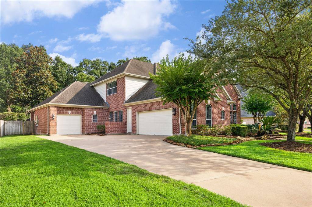 3-Car Split Garage with Functional Updates: A wide drive and an oversized 3-car garage offer both curb appeal and convenience. The tankless water heater, water softener, and new HVAC systems add efficiency, comfort, and long-term peace of mind.