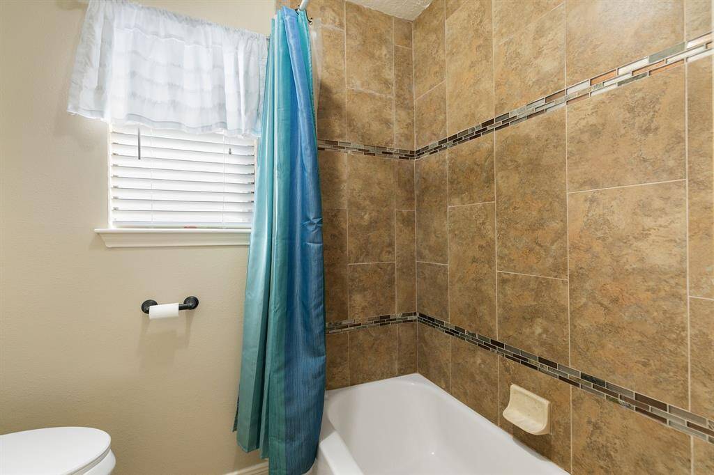 The tub/shower/toilet area can be closed off from the front of the bathroom. That way two people can get ready at the same time.