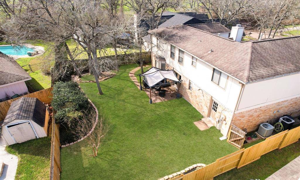 One more view of the backyard. Want to play golf? Nearby is the Pecan Grove 27 hole golf course and Country Club with tennis and multiple swimming pools (requires membership).