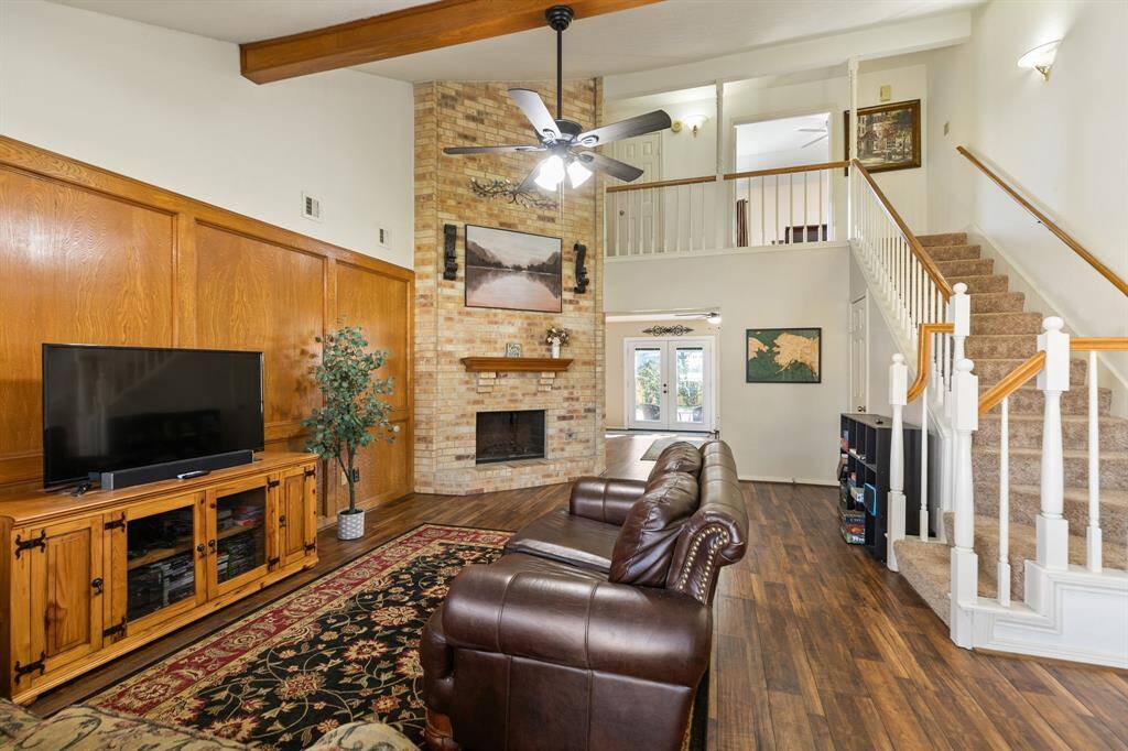 To the right of the front door is the formal dining room. It could easily be used as a study, offering versatile use of this space. This room was recently painted in a neutral color that complements any style.