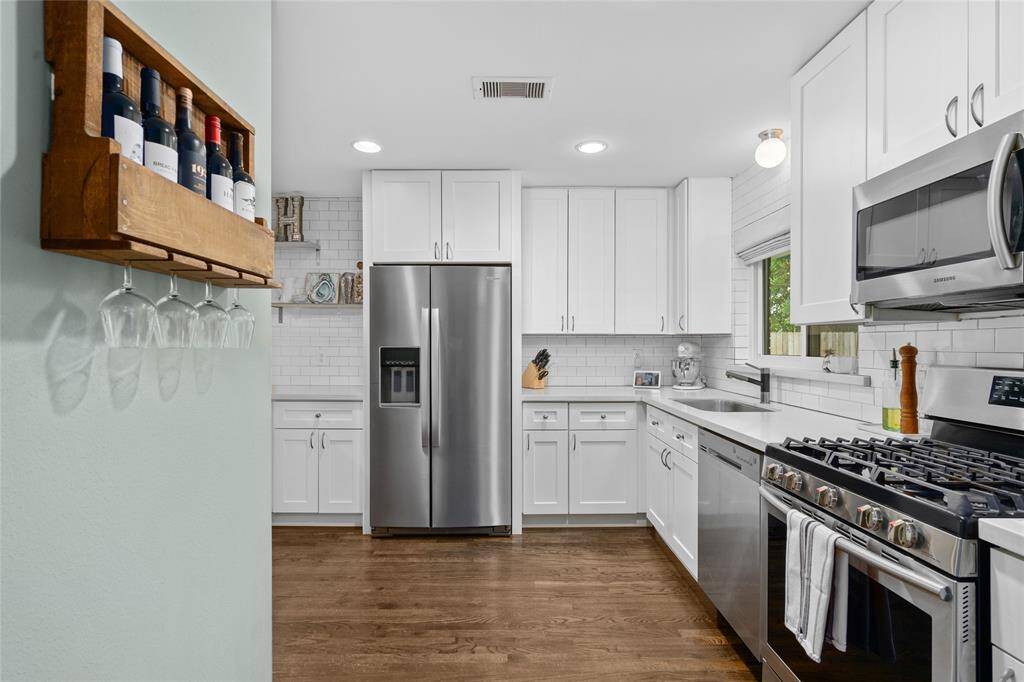 There’s plenty of cabinet space throughout the kitchen, offering convenient storage for cookware, pantry items, and more.