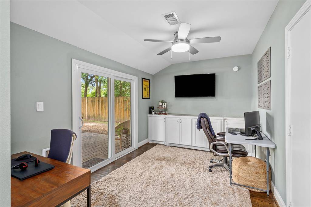 The office features direct access to the yard, making it easy to step outside for fresh air or a quick break.